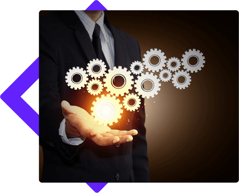 A man in a suit holding out his hands